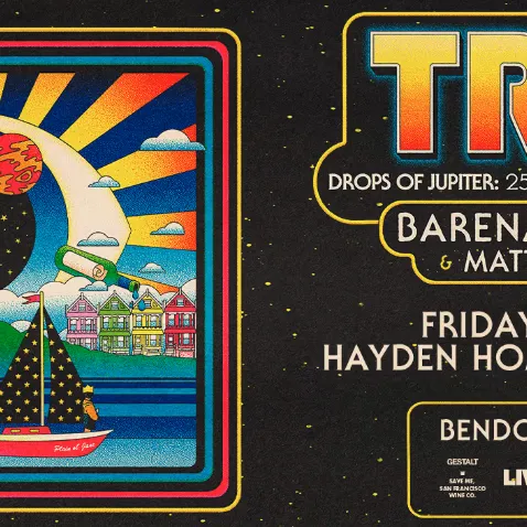 A concert poster for TRAIN with BareNaked Ladies & Matt Nathanson on Friday, August 28 at Hayden Homes Amphitheater, with space-themed art.