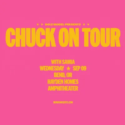 A pink poster advertising &ldquo;CHUCK ON TOUR&rdquo; with Sami, Wednesday Sep 09, Bend OR at Hayden Homes Amphitheater.