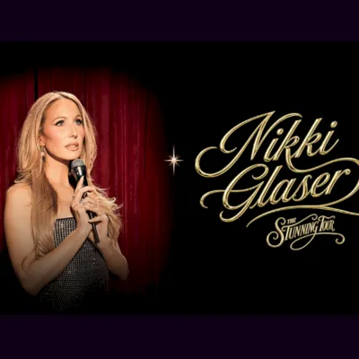 A promotional image shows comedian Nikki Glaser posing by red curtains with gold &ldquo;Nikki Glaser&rdquo; text and sparkles.